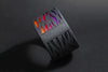Detalle del lateral del brazalete de arcilla polimérica modelo Sunset con diseño en en color degradado de púrpura a naranja