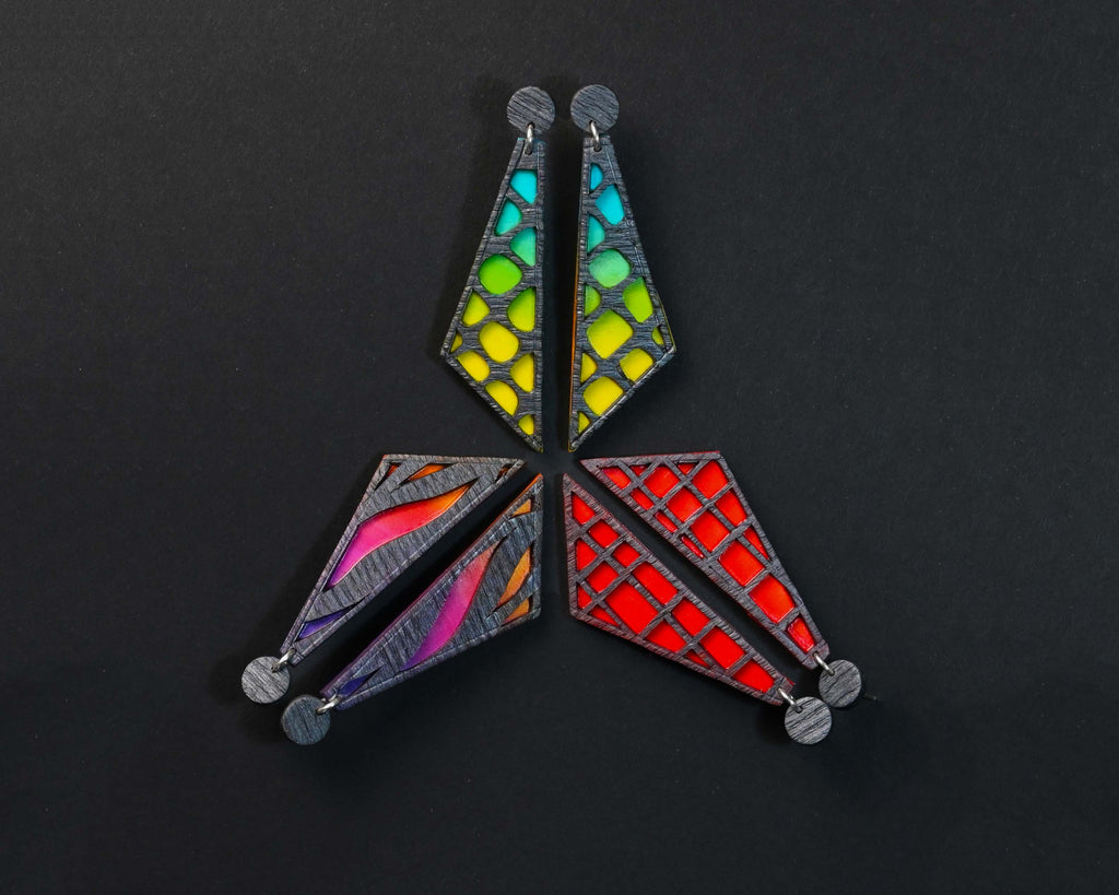 Grupo de pendientes de arcilla polimérica modelo Sunset en distintos colores