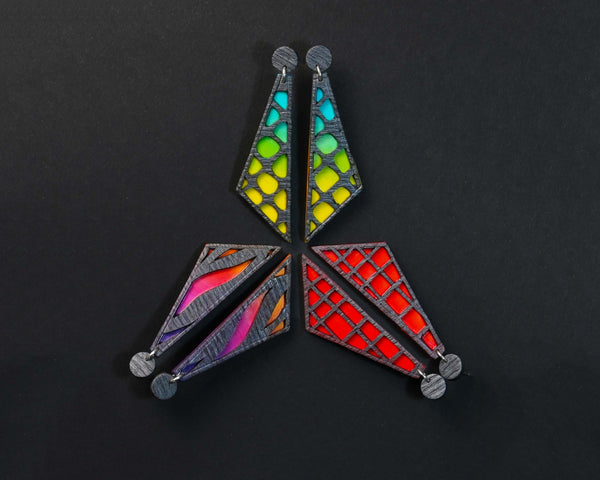 Grupo de pendientes de arcilla polimérica modelo Sunset en distintos colores